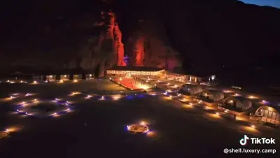 a bunch of lights in a parking lot at night at Moon night camp in Disah
