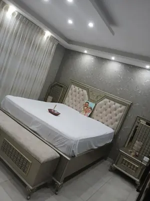 a small room with a bed with at Five-star hotel apartment in Amman