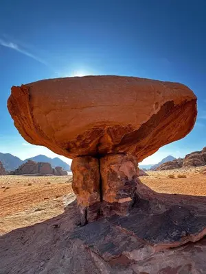a rock formation in the middle of the desert at Camp Imran Khan Wadi Rum in Aqaba