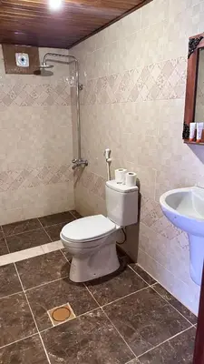 a bathroom with a toilet and a sink at Sultan rum magic camp in Aqaba