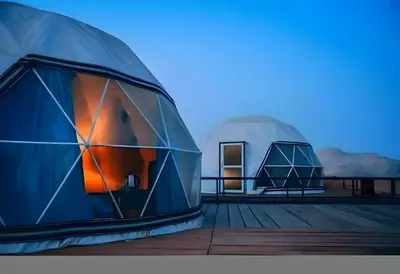 a rendering of two domes on a deck at Luxury diamond camp in Wadi Rum