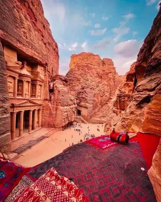 a view of a canyon with people in it at Madaba nebo home in Amman