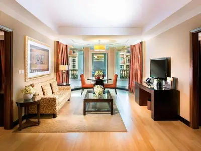 a living room with a couch and a tv at الأردن عمان in Irbid