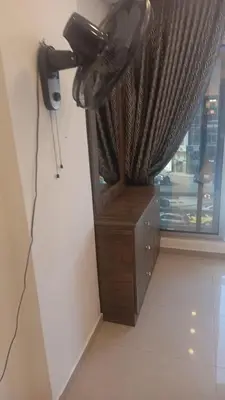 a hair dryer in a room next to a window at lNTERCoNTlNENTALALALx in Amman