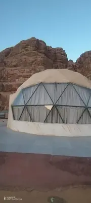 a tent in the middle of a desert at Shadow of Rum camp in Wadi Rum