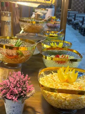 a group of bowls of food on a table at Siq Rum Luxury Camp in Wadi Rum