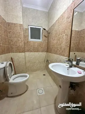 a bathroom with a toilet and a sink at studio al jubiha 1 استوديو الجبيهة in Amman