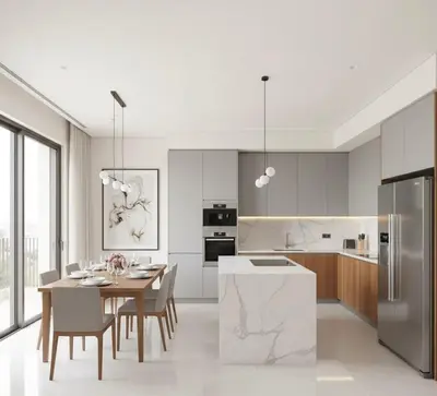 a kitchen and dining room with a table and chairs at Jreta in Amman