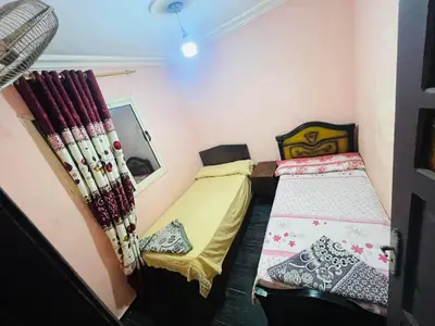 a small room with two beds in it at اهلا وسهلا في الاردن in Petra