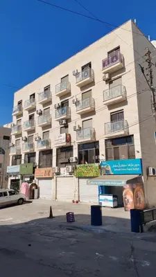 a large building with balconies on the side of it at MK5 - One bedroom Apartment in Amman