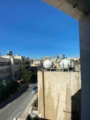 a view of a city from the top of a building at Studio for Rent in Jabal Alweibdeh-Amman - Jordan in Amman