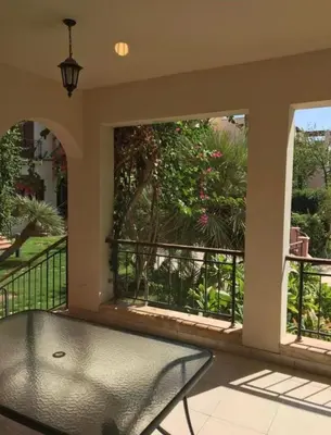 a balcony with a view of a garden at Two Bed rooms apartment in Talabay Aqaba Jordan in Aqaba