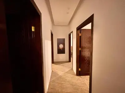a hallway with an open door and a hallway with a hallwayngthngthngthngth at Luxury comfortable apartment