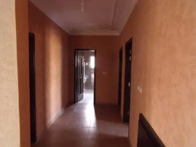 an empty hallway with a hallway leading into a room at Luxurious 5 bedroom Furnished Villa superb locationفيلا فخمه in Amman