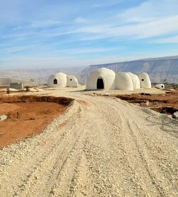 a dirt road in the middle of a desert at Tootya camp