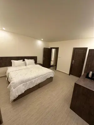 a large bedroom with a large bed in it at Midtown Lweibdeh Hostel in Amman