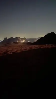 a view of the desert with mountains in the background at Desert Horizon Camp in Disah