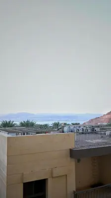 a view of the ocean from a building at قرية الراحة مرسى زايد باطلالات خلابة alraha village with Beautiful view in Aqaba