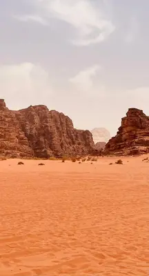 a desert with some rocks in the background at Starlight Camp in Disah