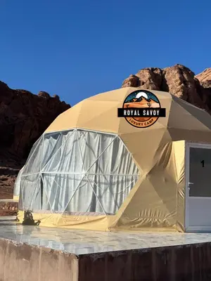 a large dome tent with a sign on it at ROYAL SAVOY lUXURY CAMP in Wadi Rum