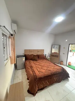 a bedroom with a large bed in a room at petra towering rock in Wadi Musa