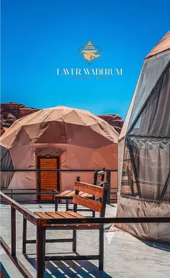 a tent with a bench in front of it at Laver wadi rum in Wadi Rum