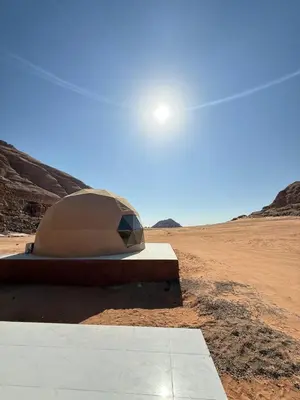 a dome in the middle of the desert at NAJMA lUXURY CAMP in Wadi Rum