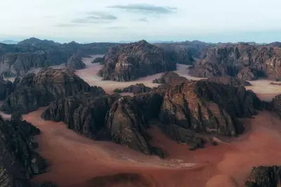 an aerial view of a mountain range at Rum Adventure Camp in Wadi Rum