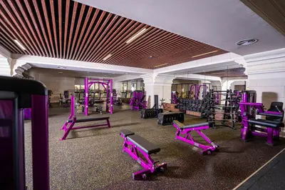 a gym with purple gym equipment in a building at كمباوند شقة مفروشة كومباوند الامعري المطار in Amman