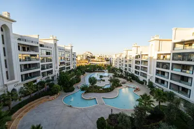 an aerial view of a courtyard in a apartment building at طريق المطار بوليفارد الامعري in Amman
