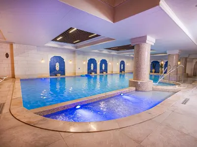 a large swimming pool in a hotel room at طريق المطار بوليفارد الامعري in Amman