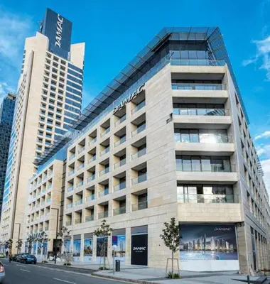 a large building on the side of a street at Studio at Damac Jordan in Amman