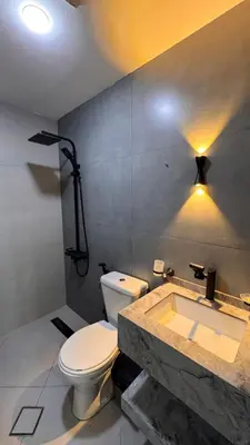 a bathroom with a toilet and a sink at شقة مفروشة apartment amman alnuzzha in Amman