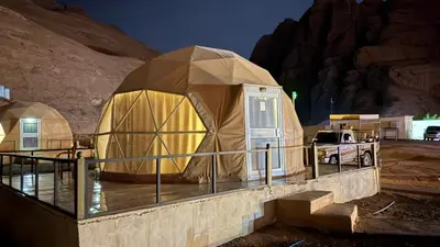 a luxury yurt in a desert at night at SARH lUXURY CAMP in Wadi Rum