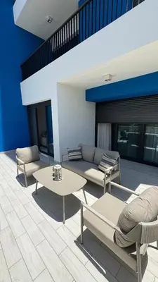 a living room with a couch and a table at Luxury apartments in Ayla in Aqaba