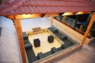 an overhead view of a building with stairs and stools at Sky Villa in Amman