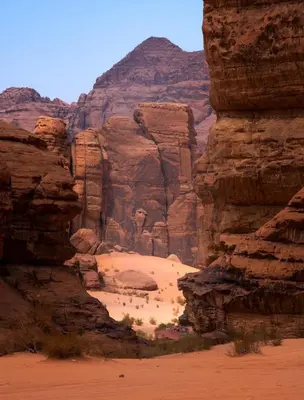 a view of a desert canyon with a rock formation at Rum Laura luxury camp in Wadi Rum