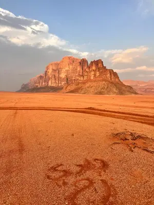 a mountain in the middle of the desert at Rum Horizon Camp& Tours in Wadi Rum