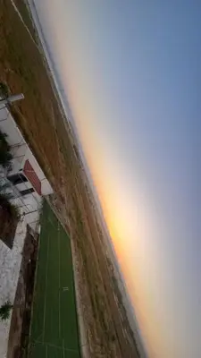 an aerial view of the ocean with the horizon at Rest Sea Chaliet & Farm