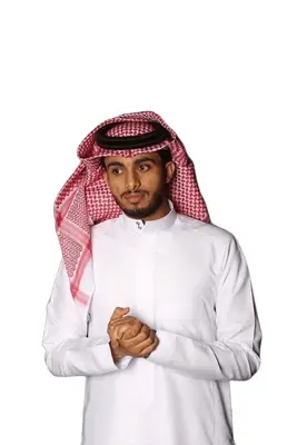 a man standing with his arms crossed at عماد رم in Wadi Rum