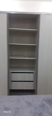 an empty closet with a white counter top at غزو 15 in Aydūn