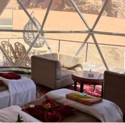 a living room with a view of the ocean from a ship at Wadi Rum, the best stars in Wadi Rum