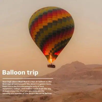 a hot air balloon flying over the desert at Wadi Rum Karolina Bubbles camp in Wadi Rum