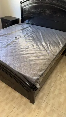 a bed with a mattress covered in a sheet at Al Jubaiha cozy studio 2 in Amman