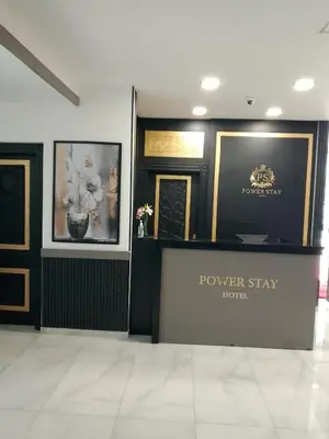 a room with a sign that says power stay hotel at Power Stay Hotel in Amman