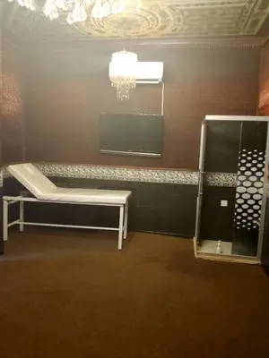 a bathroom with a sink and a mirror at Power Stay Hotel in Amman