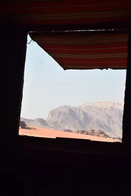 an open window with a view of the desert at Nature rum camp in Wadi Rum
