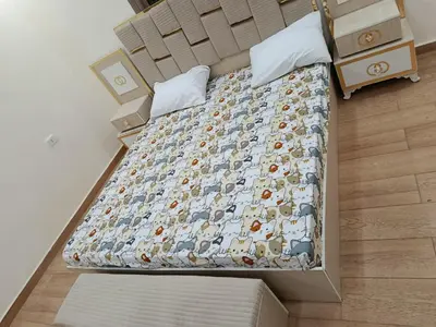 an overhead view of a bed in a room at شقه مفروشه للايجار بجانب الكارفور اربد in Irbid