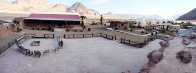 an aerial view of a building in the desert at Sultan Camp Wadi Rum in Wadi Rum