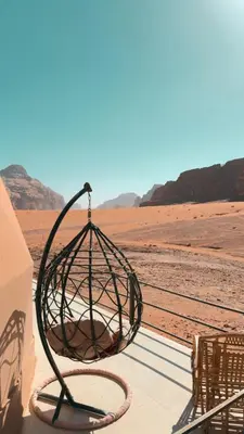 a metal basket hanging from the side of a building at Ahmad desert camp wadi rum in Wadi Rum
